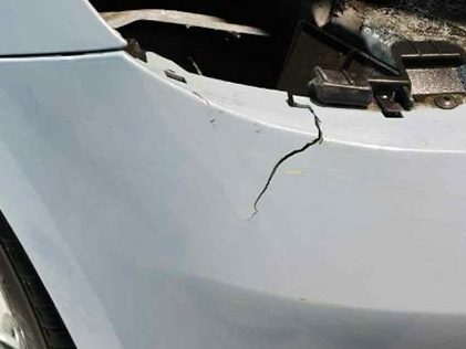 Cracked rear bumper before body repair