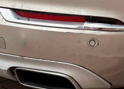 Scuff damage on a rear bumper before lease return repair